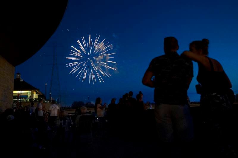 Spectators watch as fireworks illuminate the sky Monday, July 3, 2023 at Petunia Fest in Dixon. 90’s rock band Everclear finished off the weekend after the fireworks with a show on the main stage in downtown Dixon.