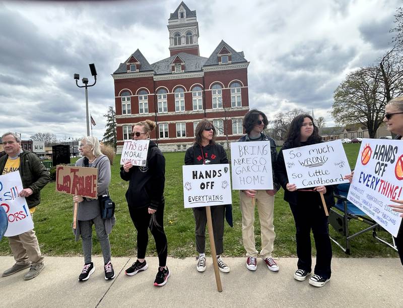 Approximately 250 people attended a Hands Off rally on Saturday, April 19, 2025 around the historic Ogle County Courthouse in Oregon. Participants carried signs critical of  the Trump administration. Saturday's rally followed an April 5 rally held at the same location.