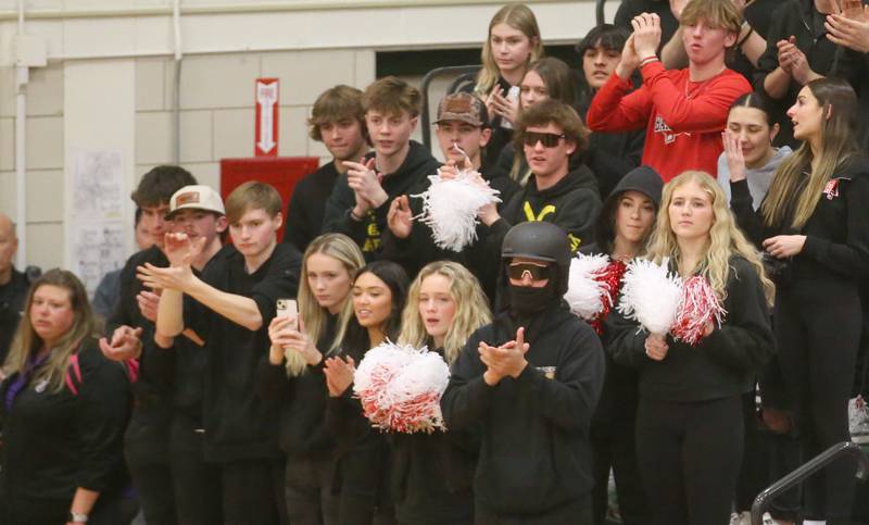Ottawa super fans cheer on the Pirates as they play Streator during the Class 3A Regional semifinal game on Wednesday, Feb. 26, 2025 in Sellett Gymnasium at L-P High School.