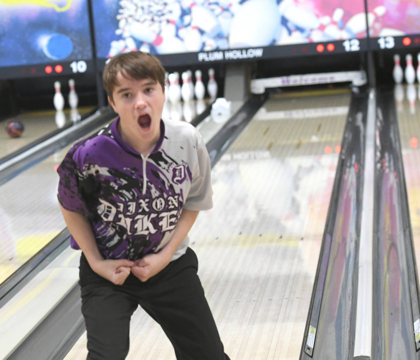 Dixon's Sam Gingras reacts to a strike as he bowls at the Hawk Classic on Dec. 3 at Plum Hollow in Dixon.