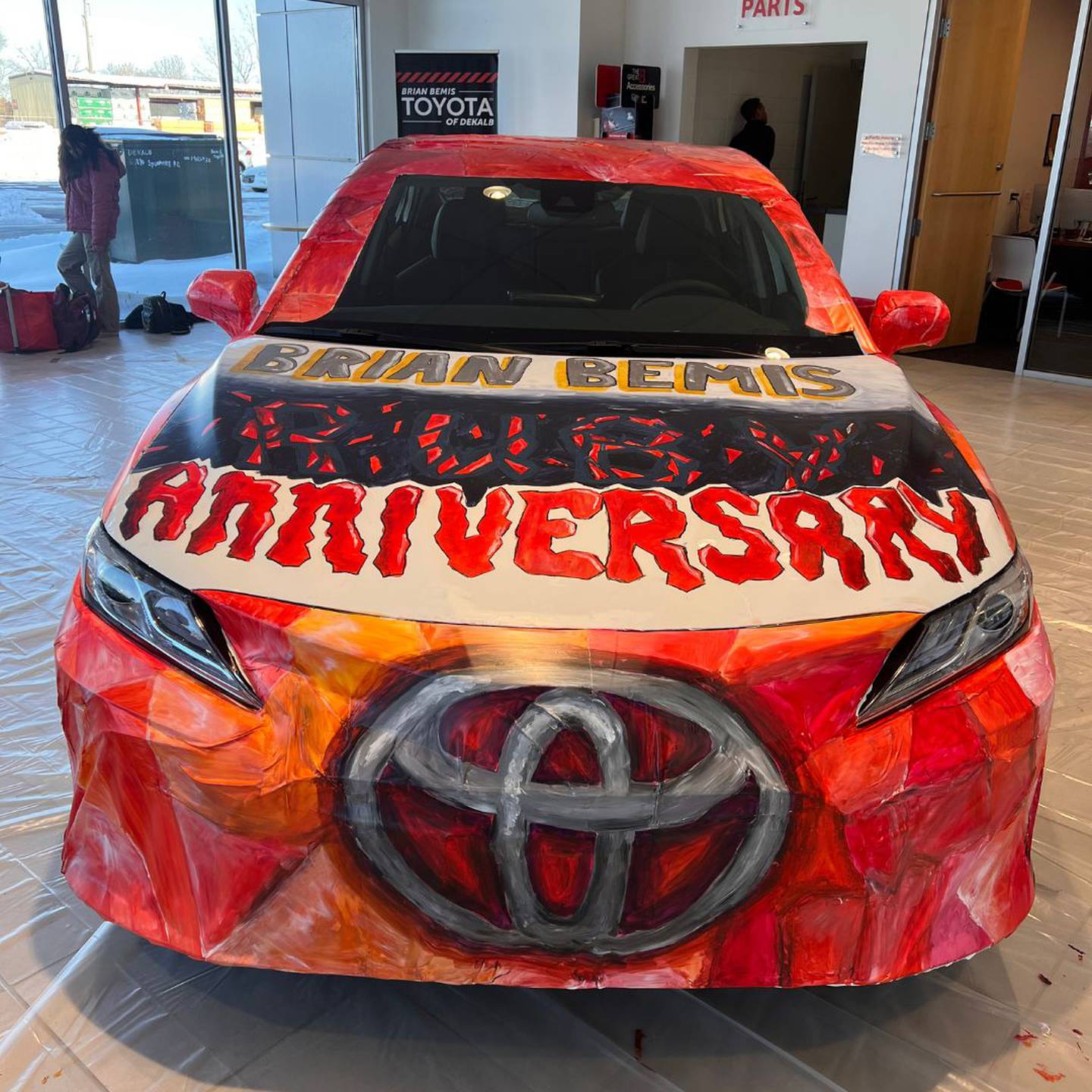 Brian Bemis Toyota of DeKalb recently held an art competition between DeKalb and Sycamore high schools. DeKalb High School won first place and received $500 and a trophy. Sycamore High School was awarded $250.