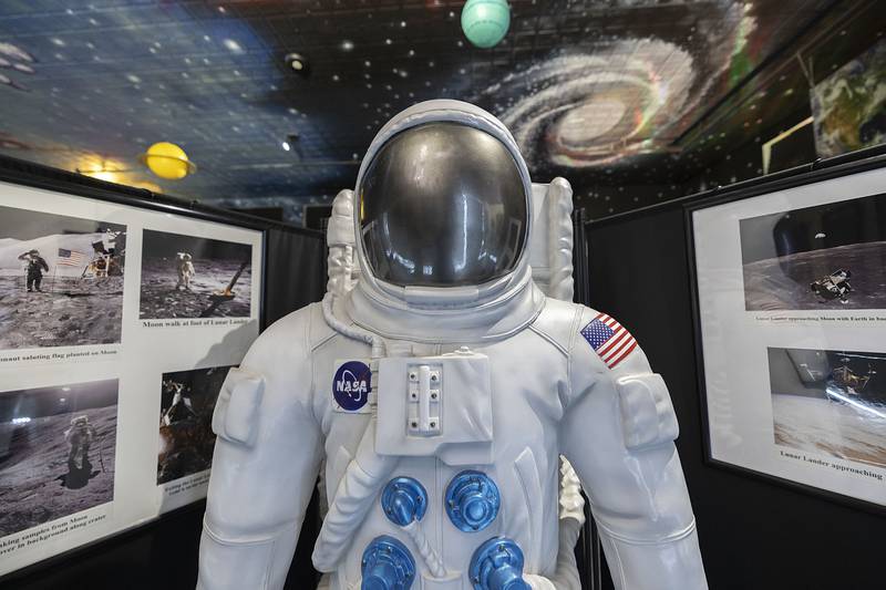 A model of the spacesuit worn for the Apollo program for human exploration of the moon is one of two suit models the exhibit contains. The other being a current design used on the international space station.