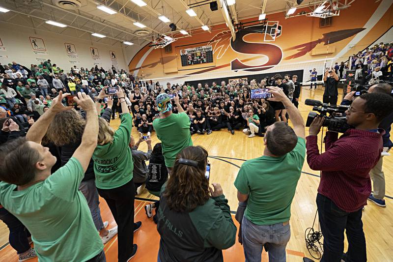 Fans take pictures of the Rock Falls volleyball team after it defeated Chicago Christian Friday, Nov. 3, 2023 in the class 2A volleyball supersectional in Sandwich.