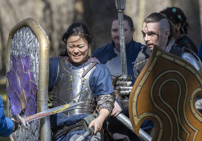 Alise Sherman (left) and Zander Dixon engage side by side in battle Saturday, April 13, 2024 during a game play clash in the campaign.
