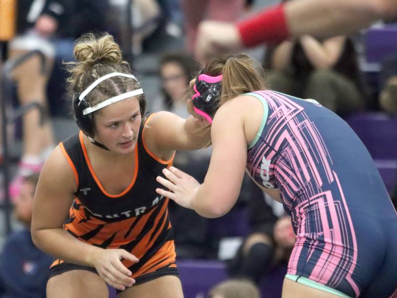 Crystal Lake Central’s Cait Jones, left, battles Woodstock’s Brianna Crown at  155 pounds in Whip-Pur Women’s Classic varsity girls wrestling on Saturday, Dec. 20, 2025, at Hampshire High School in Hampshire.