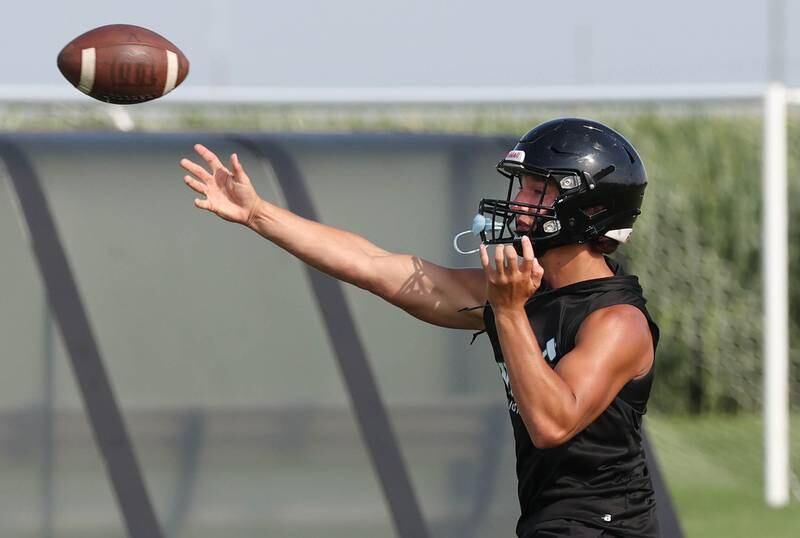 Woodstock North’s Parker Halihan throws a pass Tuesday, July 16, 2024, during their matchup with DeKalb in the Kaneland 7-on-7 at the school in Maple Park.