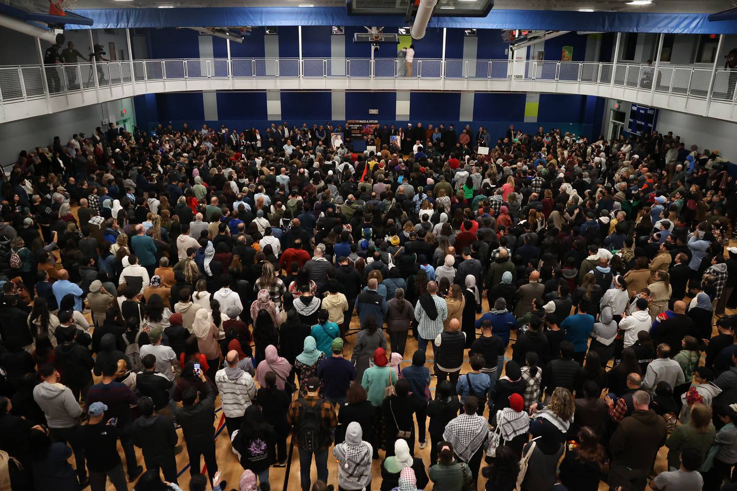 Supporters pack the gym for a vigil for Wadea Al-Fayoume at Prairie Activity & Recreation Center on Tuesday, Oct. 17, 2023 in Plainfield. The gym was at its 1.700 capacity.