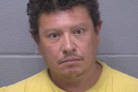 Joliet police officer bit by dog owned by man accused of pointing rifle at neighbors 
