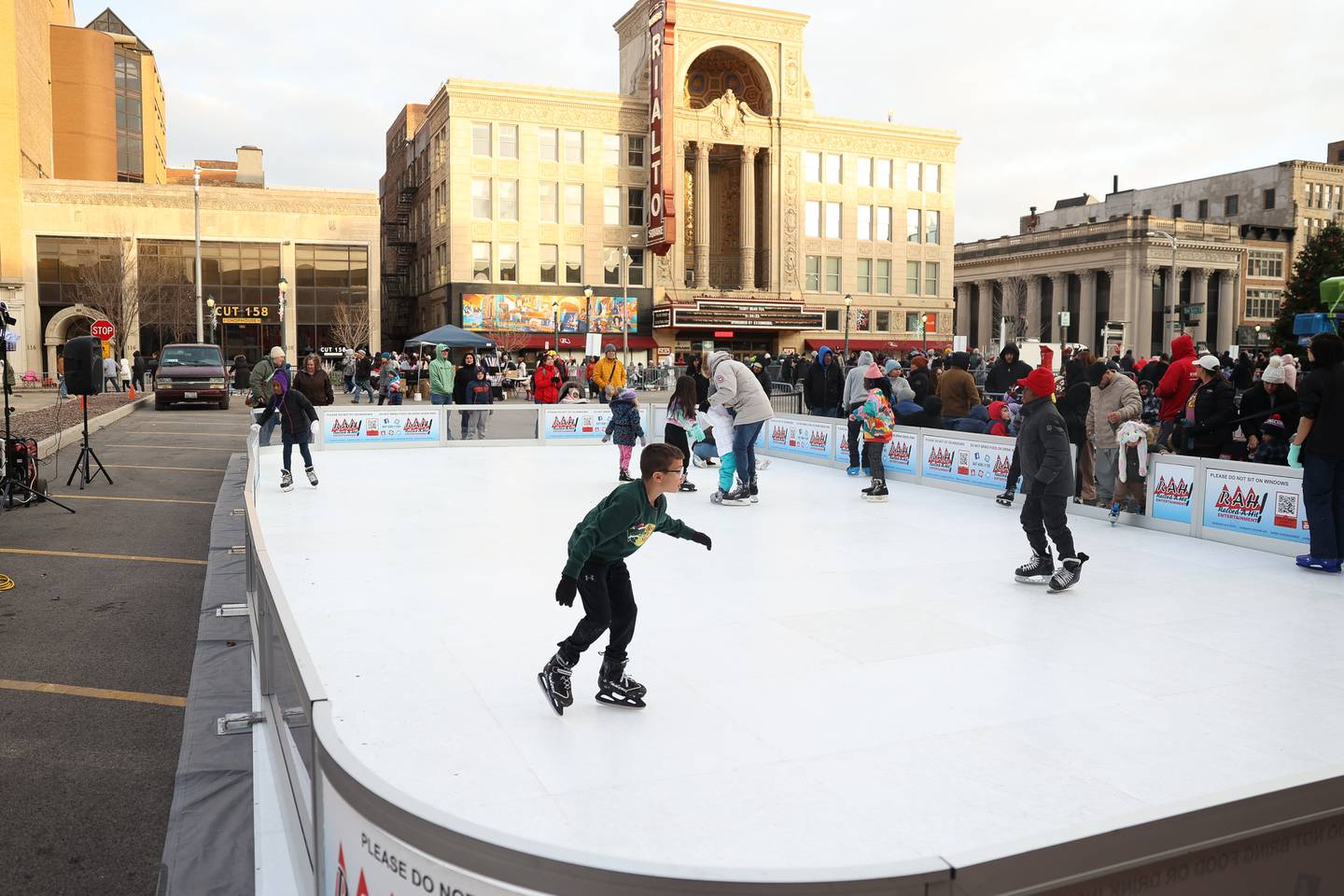 Kids skate on the ice rink at the Joliet Light up the Holidays in downtown Joliet on Friday, Nov. 24, 2023.