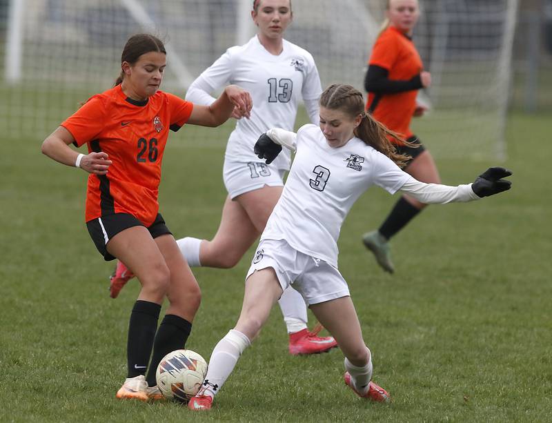 Crystal Lake Central's Skyler Ferrero battles with Kaneland's Zoe Gannon for control of the ball during a nonconference soccer game on Thursday, April 10, 2025, at Crystal Lake Central High School.