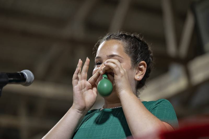 Alayna Doane, 12, shows off her hidden talent at the Ogle County Junior Miss pageant Thursday, July 30, 2025, at the Ogle County Fairgrounds.