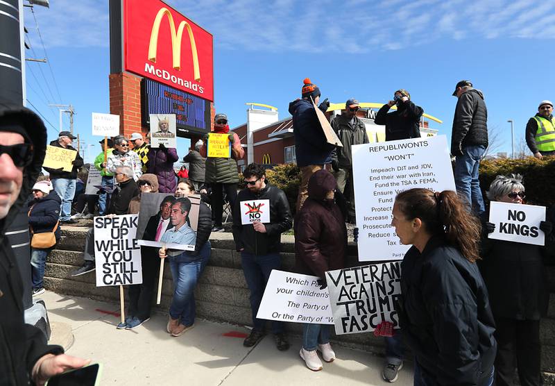 Protesters line State Route 31 near the intersection of McCullom Lake Road in McHenry to protest their discontent with President Donald Trump and his administration's policies on Saturday, March 28, 2026, during the McHenry County No Kings Protest. According to an organizer, over 4,000, people took part in the protest.