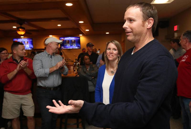 Republican Rick Amato gives his victory speech with wife Renee at his side on Tuesday at the DeKalb Moose Lodge.