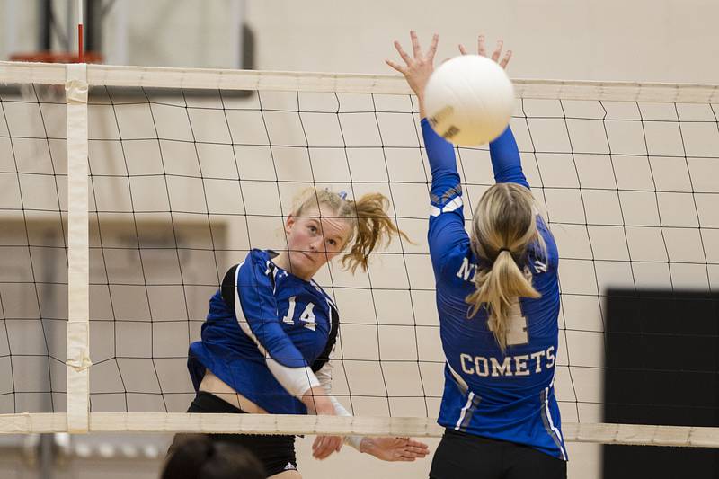 Newark’s Lauren Ulrich hammers the ball in the semifinal sectional game Monday, Oct. 31, 2022 against Newman.