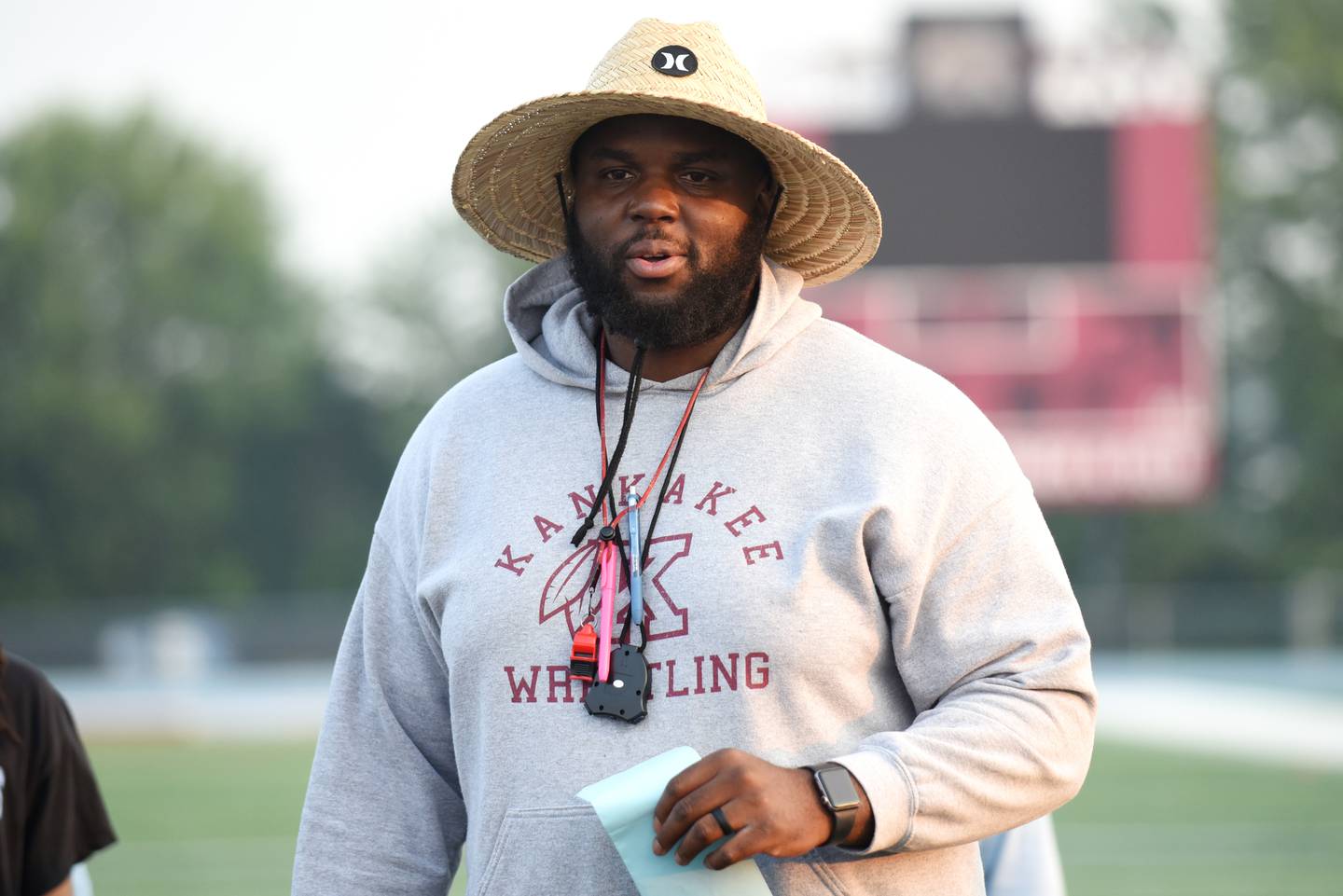 Kankakee football coach Ed Hazelett addresses the team following their summer camp Thursday, July 31, 2025.