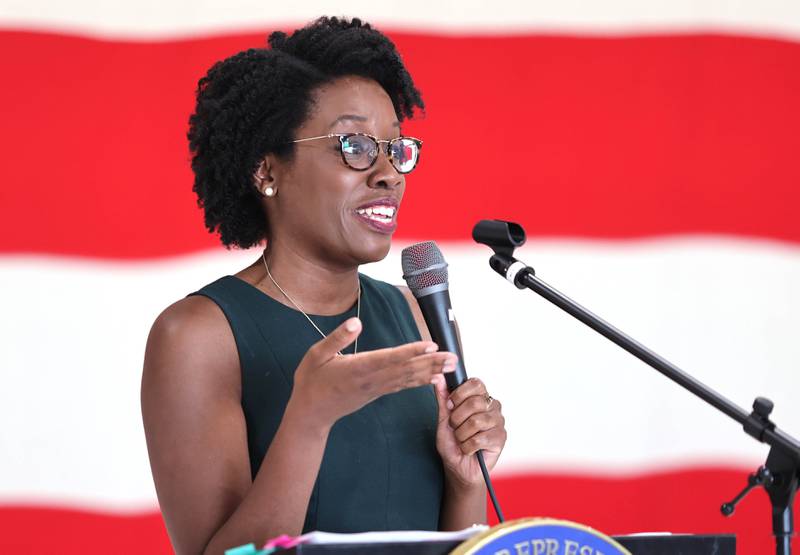 U.S. Rep. Lauren Underwood, D-Naperville, answers a question from the audience Tuesday, Aug. 23, 2022, during a town hall meeting in one of the hangers at the DeKalb Taylor Municipal Airport.