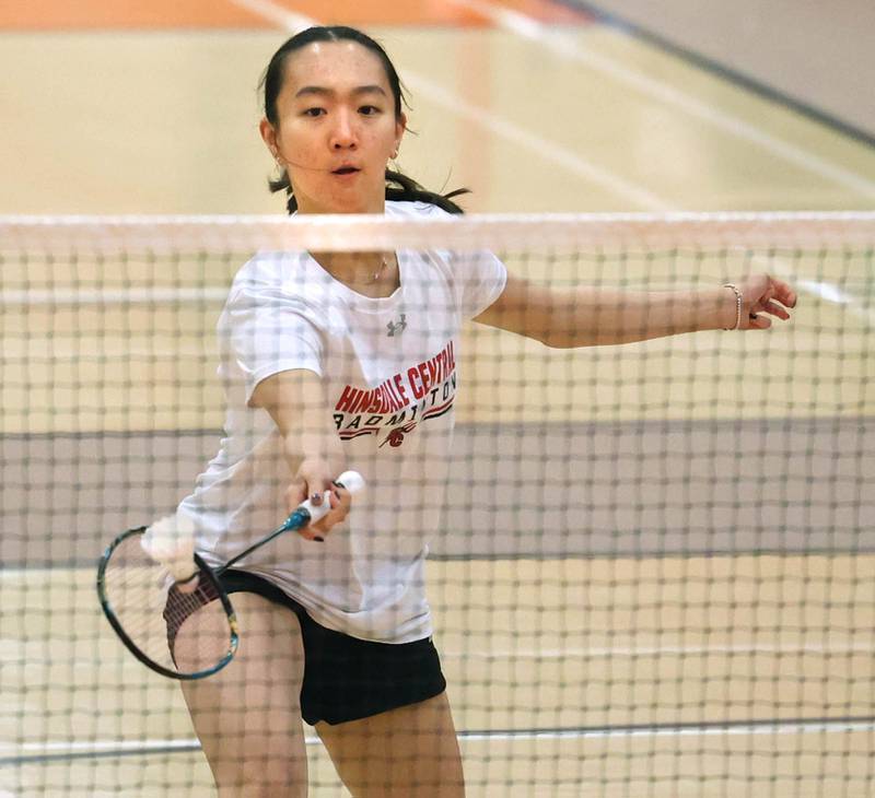 Hinsdale Central junior Kacy Liu hits a shot during her match against Haasini Vidapalapati, a junior at Rolling Meadows, Friday, May 10, 2024, during the IHSA State Badminton Finals at DeKalb High School. Liu fell to Vidapalapati in her first round match.