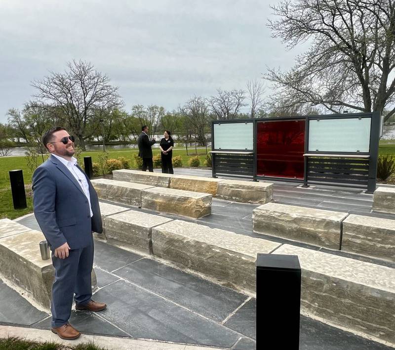 Sauk Valley Community College's Kent Sorenson, Jon Mandrell and Lori Cortez stand beside the college's new outdoor classroom in Dixon, Illinois.