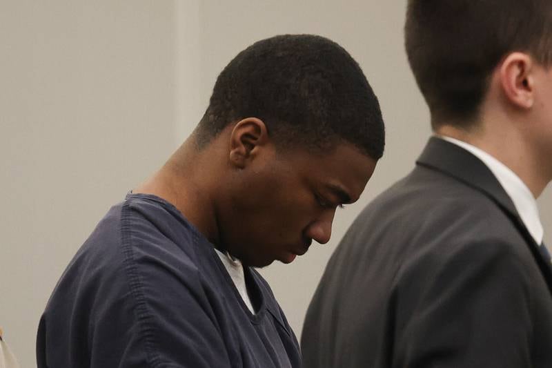 Byrion Montgomery, 17, of Bolingbrook, hangs his head upon hearing he will be transferred from River Valley Juvenile Detention Center to Will County Jail when he turns 18 on April 28th at his hearing at the Will County Courthouse on Thursday, March 30, 2023 in Joliet. Montgomery is accused of the murders of Cartez Daniels, 40, Samiya Shelton-Tillman, 17, and Sanai Daniels, 9, at a residence in the 100 block of Lee Lane in Bolingbrook, as well as attempted first-degree murder of Tania Stewart.
