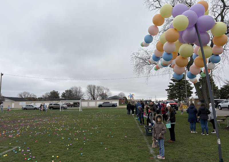 Families line up ahead of Ottawa's Easter Egg Hunt on Saturday, April 4 at Peck Park in Ottawa.