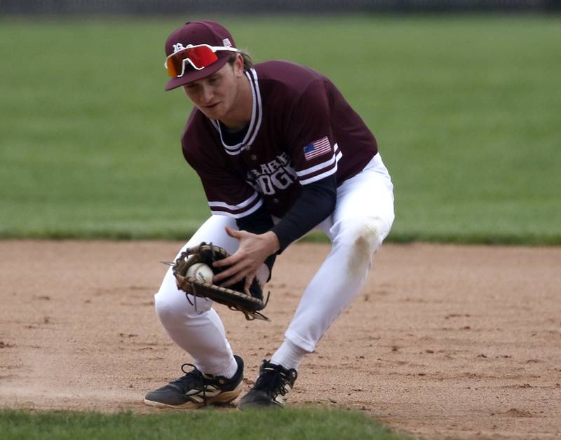 Prairie Ridge's Jack Herman fields the ball during a Fox Valley Conference baseball game against Huntley on Friday, May 1, 2026, at Prairie Ridge High School.