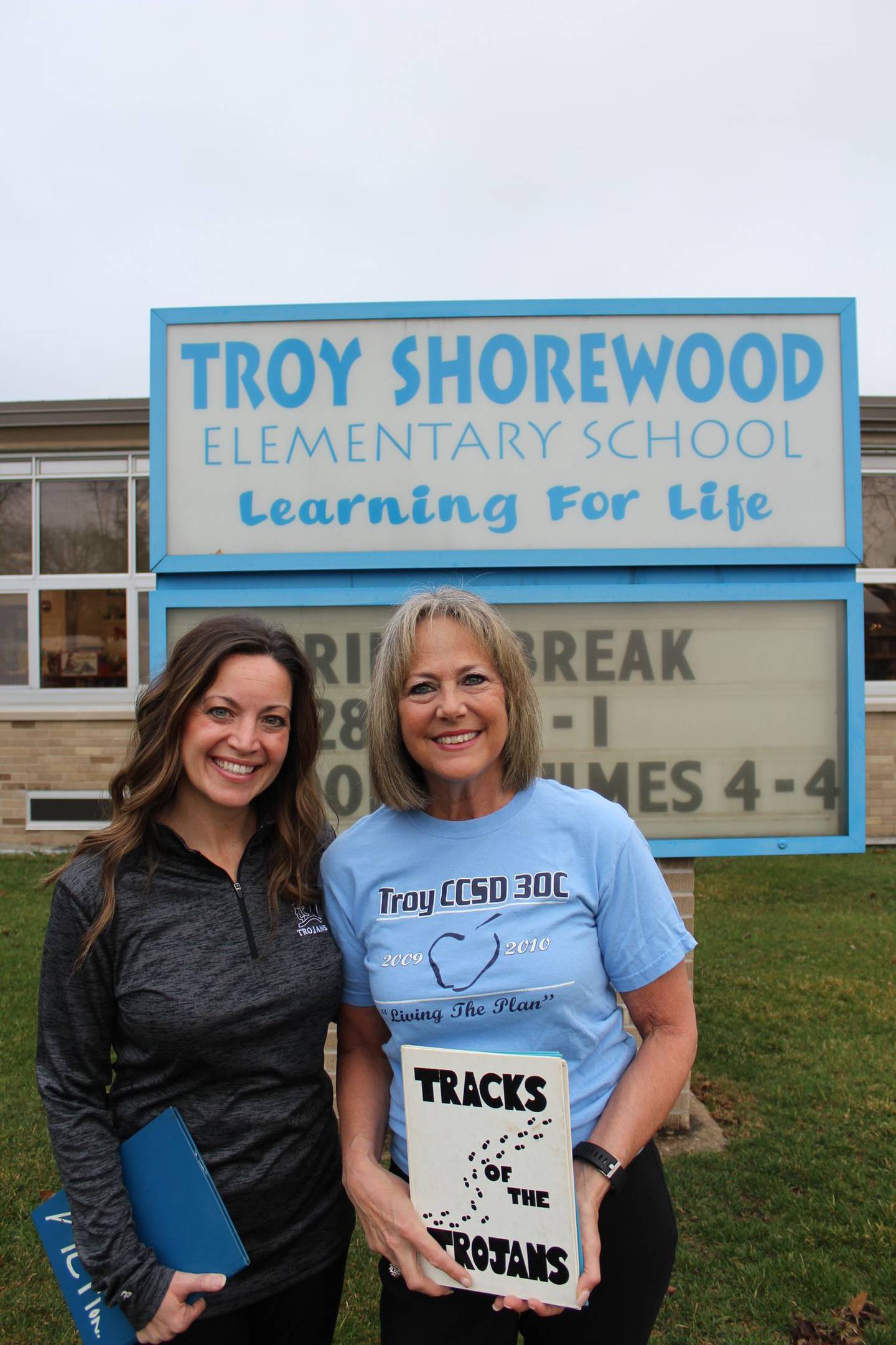 Kristi Kennedy, a 16-year teacher for Troy Community Consolidated School District 30-C (left), and Vicki Petrovic a 21-year year teacher for the district, both attending Shorewood Elementary School, which is celebrating its 70th anniversary. Kennedy currently teachers second grade at Shorewood Elementary and Petrovic teaches third. They both live in Shorewood, too.