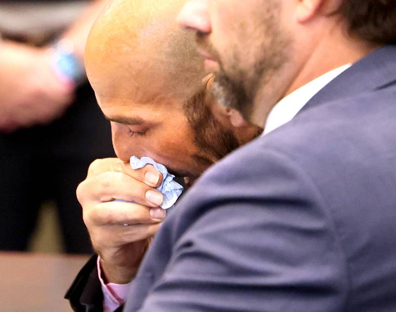 Nathan P. Sweeney, (left) 45, of DeKalb, becomes emotional behind his attorney John Kopp Thursday, June 26, 2025, as lead prosecutor Scott Schwertley recounts the details of the 2024 crash during his plea hearing at the DeKalb County Courthouse in Sycamore. Sweeney pleaded guilty Thursday for driving under the influence on March 28, 2024, and causing a crash that killed DeKalb County sheriff‘s deputy Christina Musil.