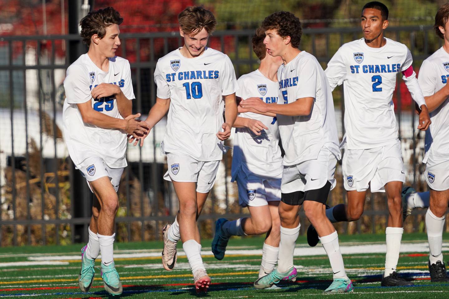 St. Charles North's Diego Torres (10) smiles after scoring a goal against Glenbard West during a class 3A Glenbard West Regional final soccer match at Glenbard West High School in Glen Ellyn on Saturday, Oct. 26, 2024.
