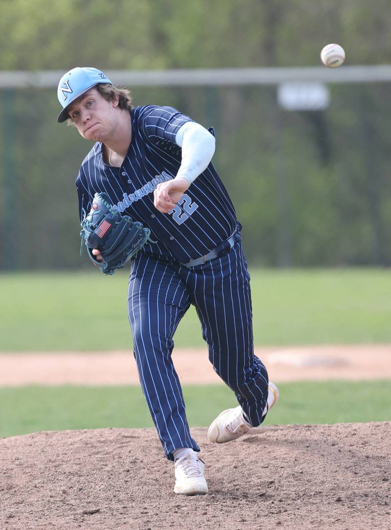 Nazareth's John Hughes (22) pitches during the varsity baseball game between Benet Academy and Nazareth Academy in La Grange Park on Monday, April 24, 2023.
