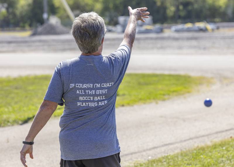 Dianne Tarmann tosses a bocce ball towards the pallino while warming up prior to the Chuck Rolinski's Labor Day Bocce Tournament in Toluca on September 1, 2024.