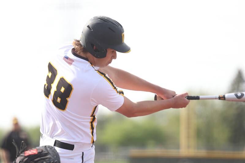 Joliet West’s Zackry Tarrant Singles against Joliet Central on Tuesday, May 9, 2023 in Joliet.