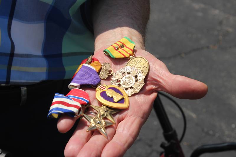 Ben Jankowski of Woodstock holds his medals June 6, 2025.