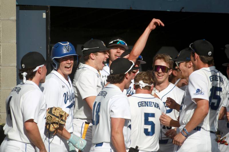 Geneva players celebrate a 3-run home run by teammate Kollin Mickelson during a game against St. Charles East at Judson University in Elgin on Tuesday, May 7, 2024.