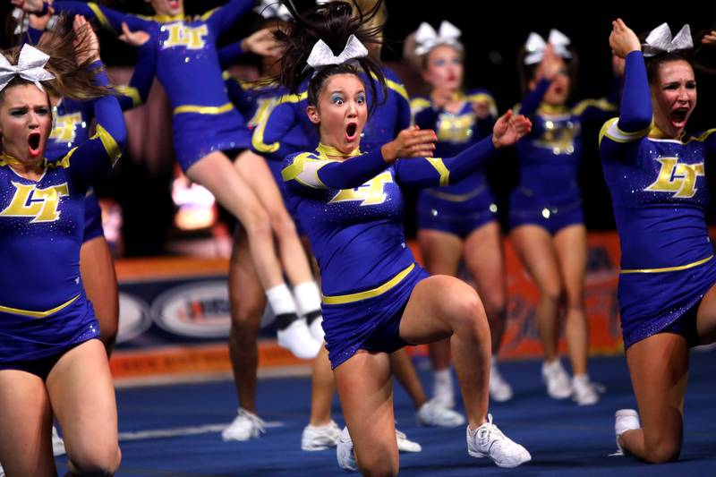 Members of the Lyons Township cheerleading team compete in the coed team division of the IHSA State Finals on Saturday, Feb. 8, 2025 at Grossinger Motors Arena in Bloomington.