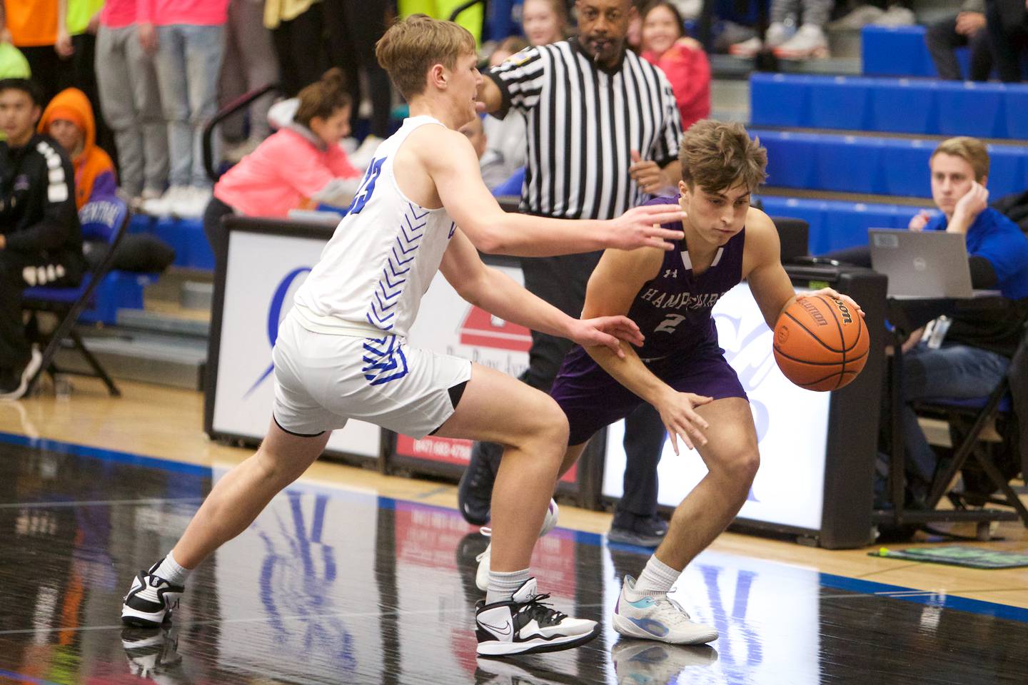 Hampshire's Joseph Costablle looks to advance the ball against Burlington Central's Jacob Johnson on Wednesday, Nov. 30,2022 in Burlington.