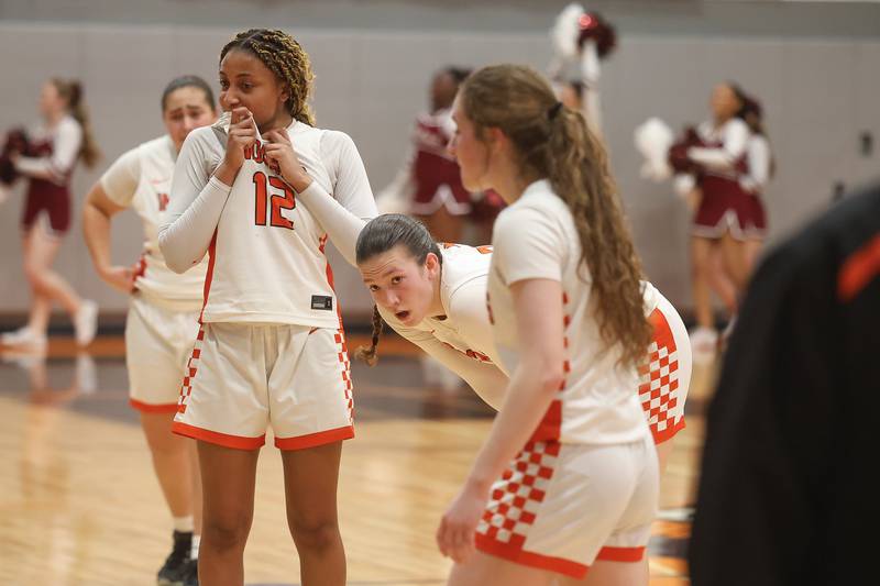 Minooka players react after losing to Moline 57-49 in the Class 4A Minooka Regional championship game on Thursday, Feb. 19, 2026 in Minooka.