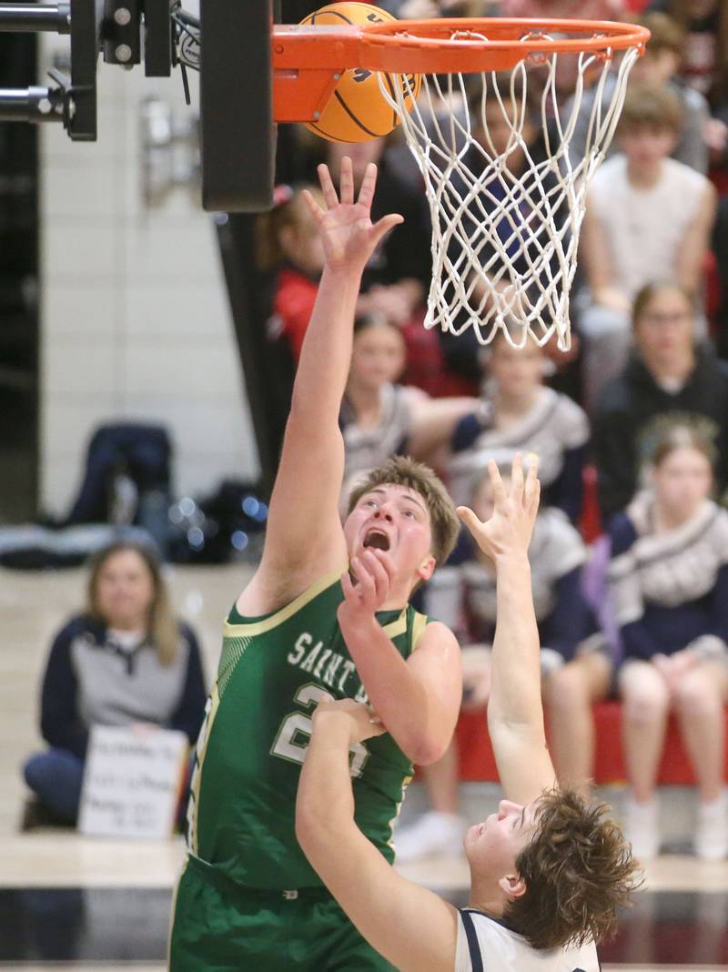 St. Bede's Jake Miglorini lets go of a shot over Ridgeview's Jack Pierce during the Route 17 Classic Tournament on Wednesday, Nov. 27, 2024 at Woodland High School.