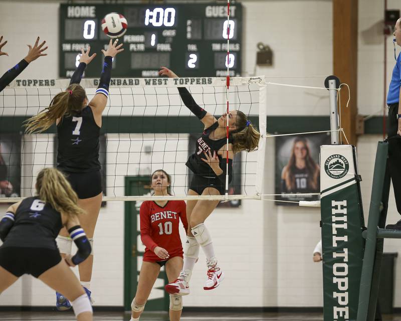 Benet's Sophia Chinetti (7) smashes the ball for a kill attempt during Class 4A Glenbard West Sectional final volleyball match between St Charles North at Benet. Nov 6, 2025 in Glen Ellyn.