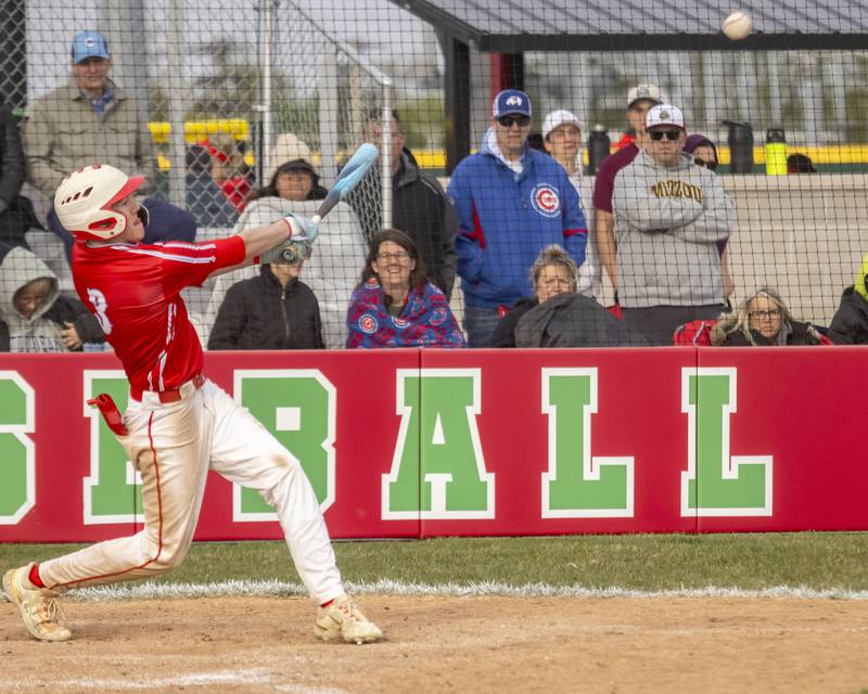 Jaxon Cooper of Ottawa High School drives a ball deep into the outfield during the game against LaSalle Peru High School at the L-P Athletic Complex on April 22, 2024.