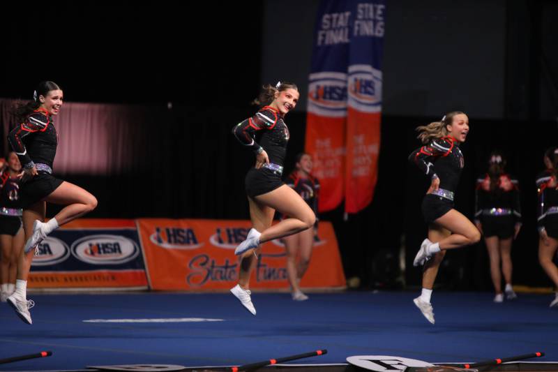 Members of the Lincoln-Way West cheerleading team compete in the large team division of the IHSA State Finals on Saturday, Feb. 8, 2025 at Grossinger Motors Arena in Bloomington.