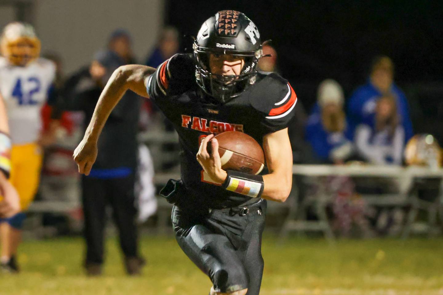 Quarterback Seth Jones of Flanagan-Cornell/Woodland runs with ball against Galva on Friday, October 25, 2024 at Flanagan High School in Flanagan.