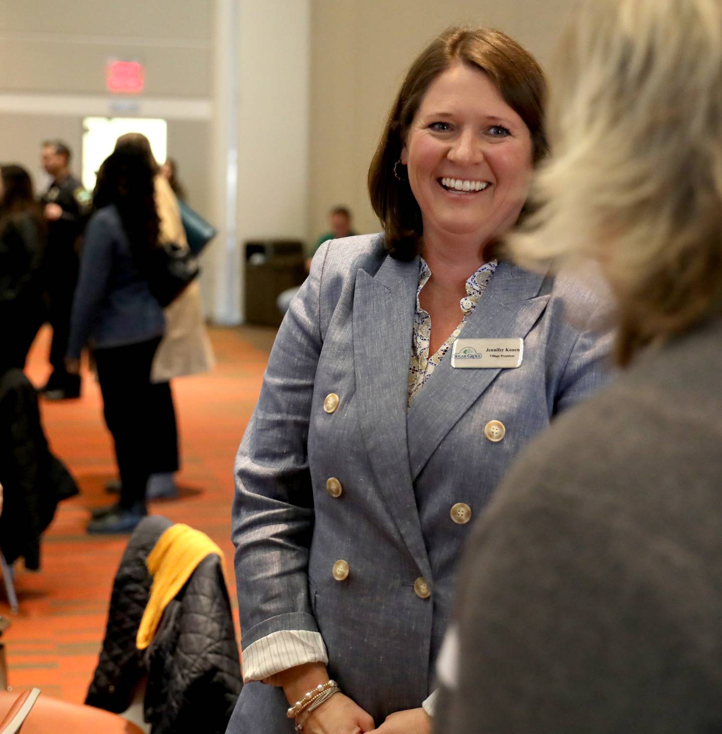 Sugar Grove Village President Jennifer Konen chats with community members following the State of the Village address at Waubonsee Community College in Sugar Grove on Tuesday, Feb. 28, 2023.