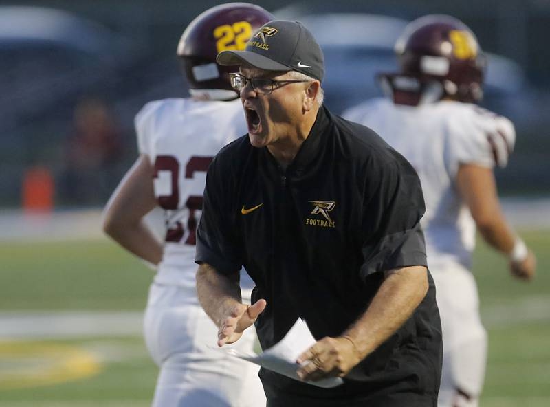 Richmond-Burton Head Coach Mike Noll yells at his team after they give up a Johnsburg touchdown during a Kishwaukee River Conference football game on Friday, Sept. 12, 2025, at Johnsburg High School.