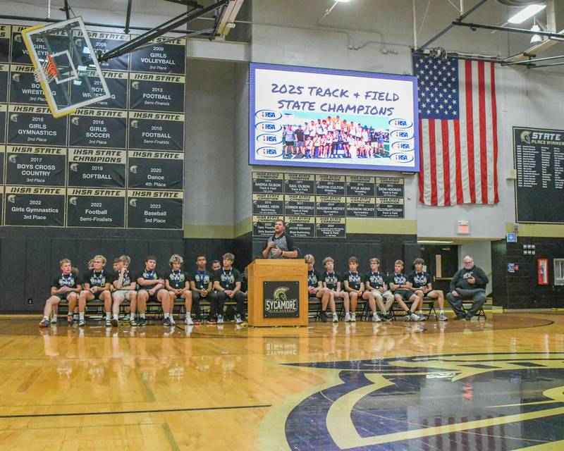 Sycamore head boys track coach Matt Kosecki talks during the pep rally on Tuesday June 4, 2025, at Sycamore High School after the team brought back the championship trophy.