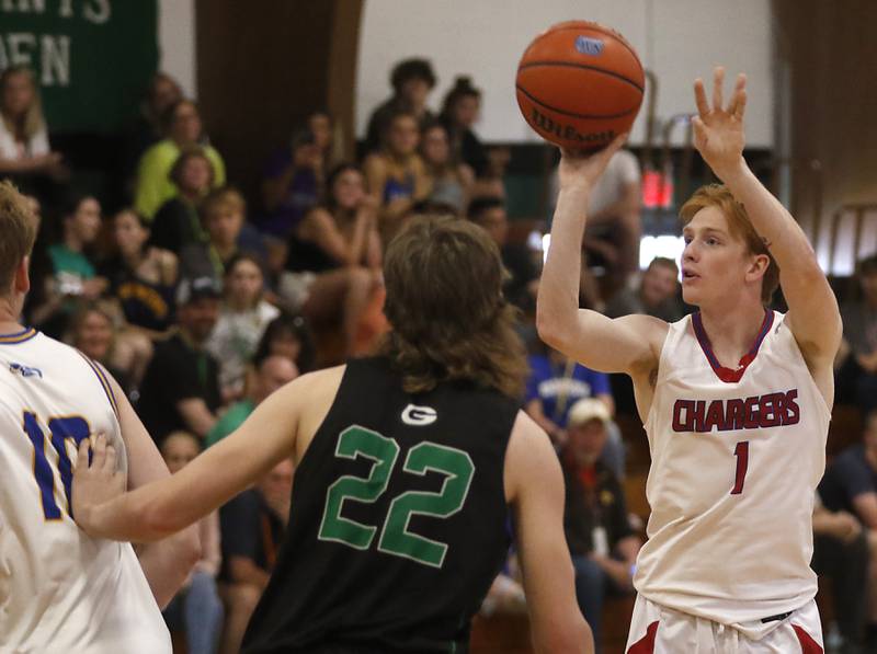 Dundee-Crown’s Zach Randl shoots the ball over Alden-Hebron’s Nolan Vanderstappen during the boy’s game of McHenry County Area All-Star Basketball Extravaganza on Sunday, April 14, 2024, at Alden-Hebron’s Tigard Gymnasium in Hebron.