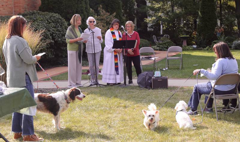 (Left to right) Robin Perrone, Sandi Bowgren, Pastor Jane Perkolup and Linda Pierpoint sing during the Blessing of the Animals at Geneva Lutheran Church on Saturday, Oct. 5, 2024.
