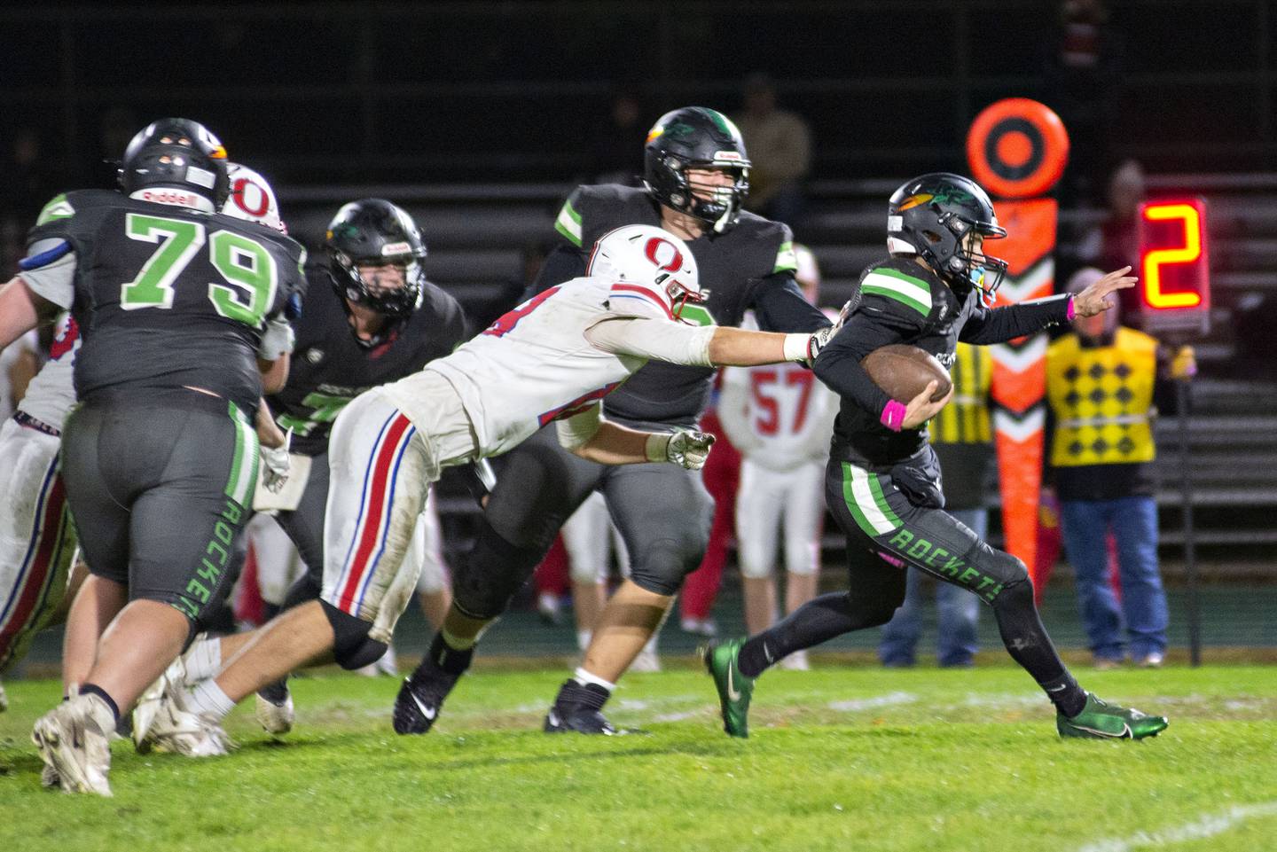 Rock Falls’ Kohle Bradley cuts through the middle against Oregon Friday, Oct. 14, 2022.