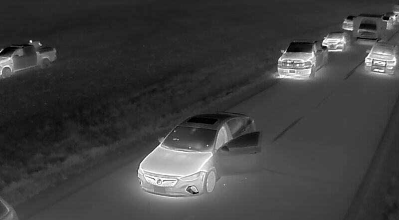 Illinois State Police on Thursday, Nov. 21, 2024, released infrared drone and regular drone footage showing aerial video of an Oct. 23, 2024, police standoff between Abram Perez, 42, of Rockford, and the DeKalb County Special Operations Team. Perez was fatally shot by a DeKalb police officer after an hourslong standoff where he took a woman hostage and then fired a handgun multiple times at police. (Screengrab by Shaw Local of the ISP footage)