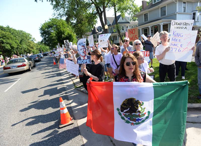 People including Arlinda Nunez of Hinsdale chant "No Hate, No Fear, Immigrants are Welcome Hear" during the nationwide No Kings Day Rally held in LaGrange Saturday June 14, 2025.