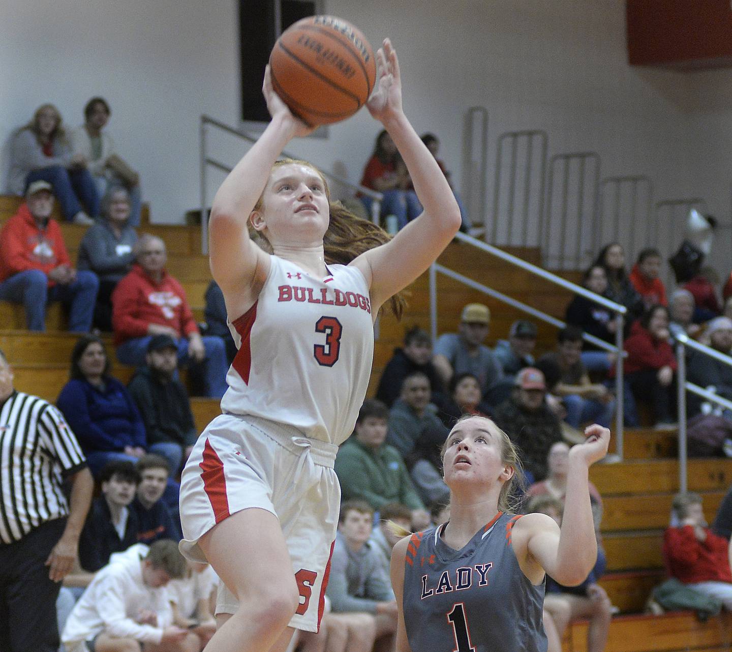 Streator’s Ellie Isermann (3) shoots as Flanagan-Cornell/Woodland’s Ella Derossett (1) trails the play Tuesday, Jan. 24, 2023 at Streator High School.